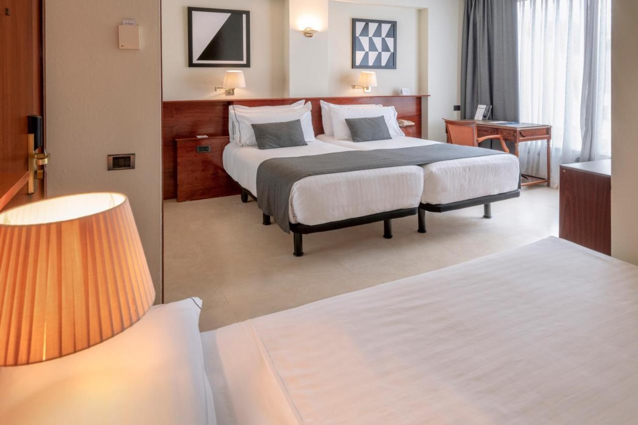 Double or Twin Room with Extra Bed (2 Adults + 1 Child)