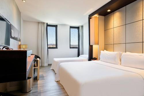 Habitación Doble Estándar con cama supletoria