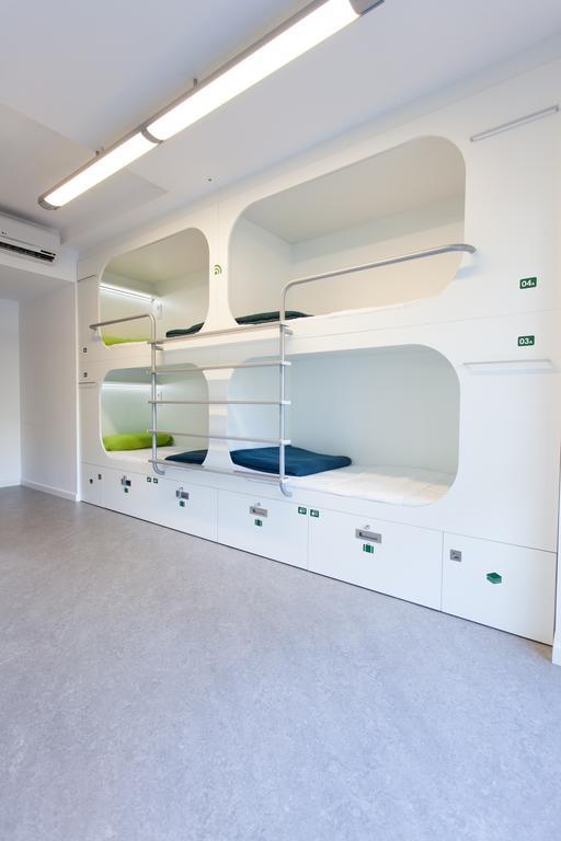 Cama en habitación compartida de 6 camas