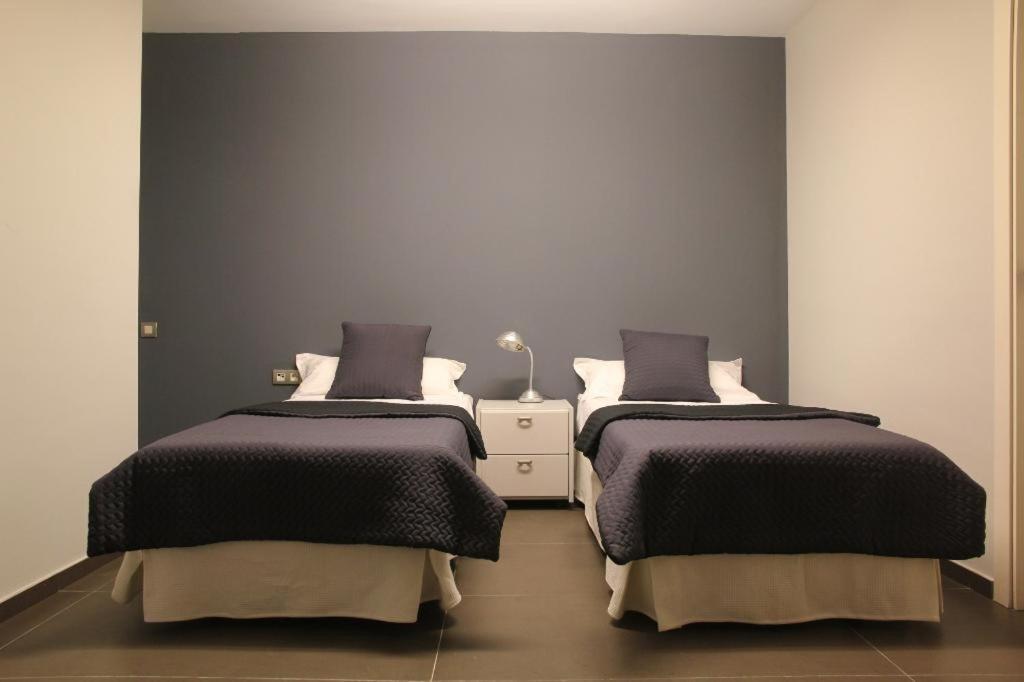 Camera Doppia con Letti Singoli con Letto Supplementare