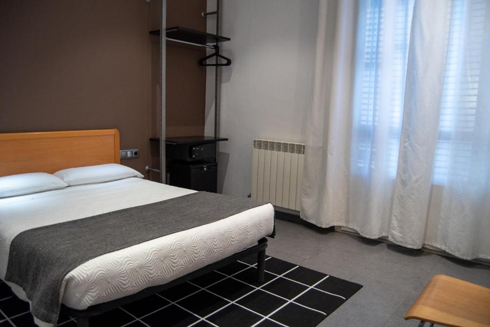 Quarto Duplo com Banheiro Compartilhado