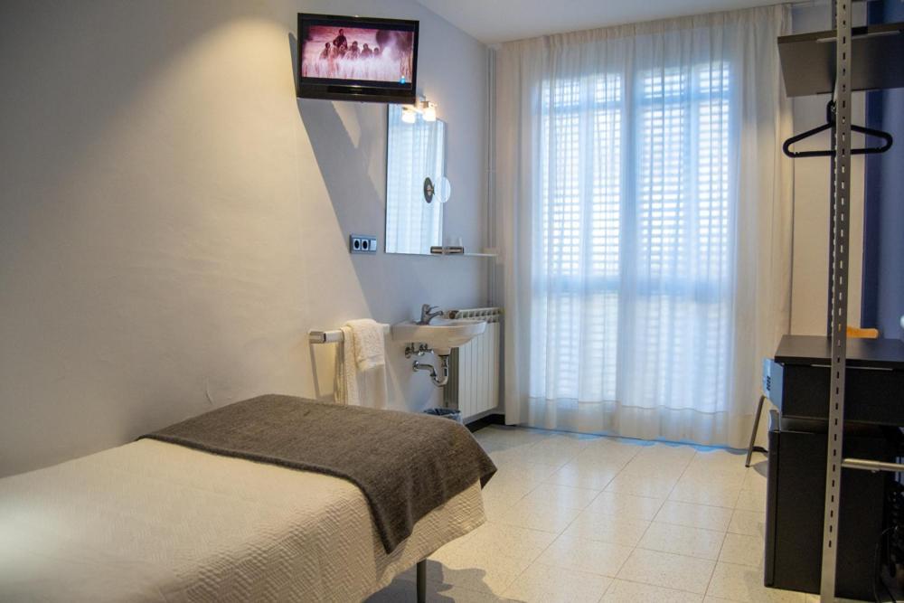 Quarto Individual com Banheiro Compartilhado